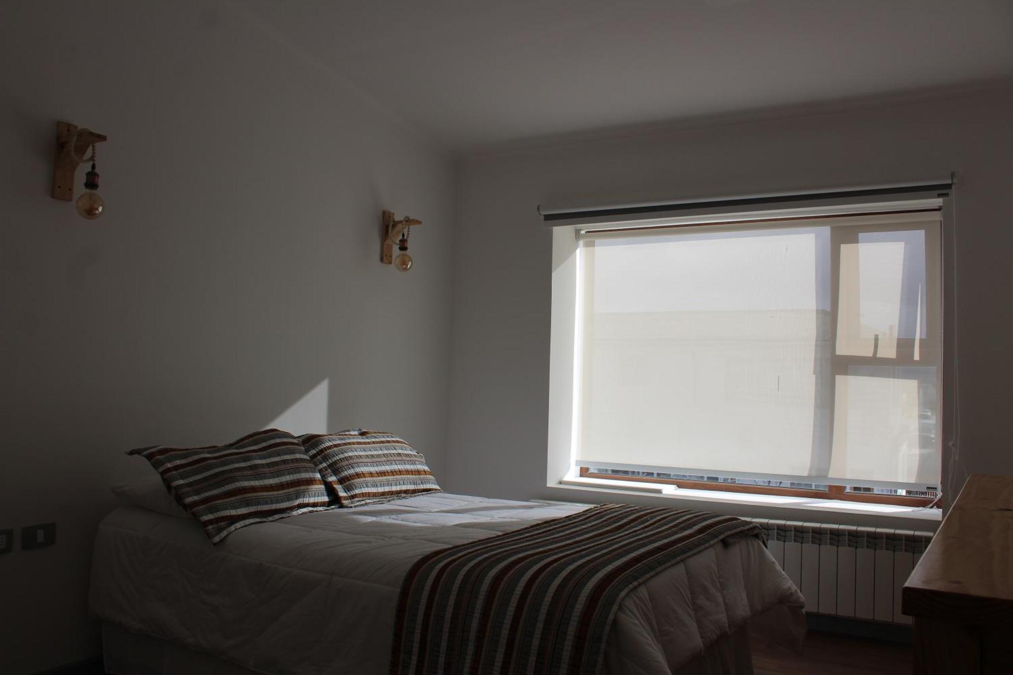 Hostal Alamo Patagonico Пуерто-Наталес Екстер'єр фото